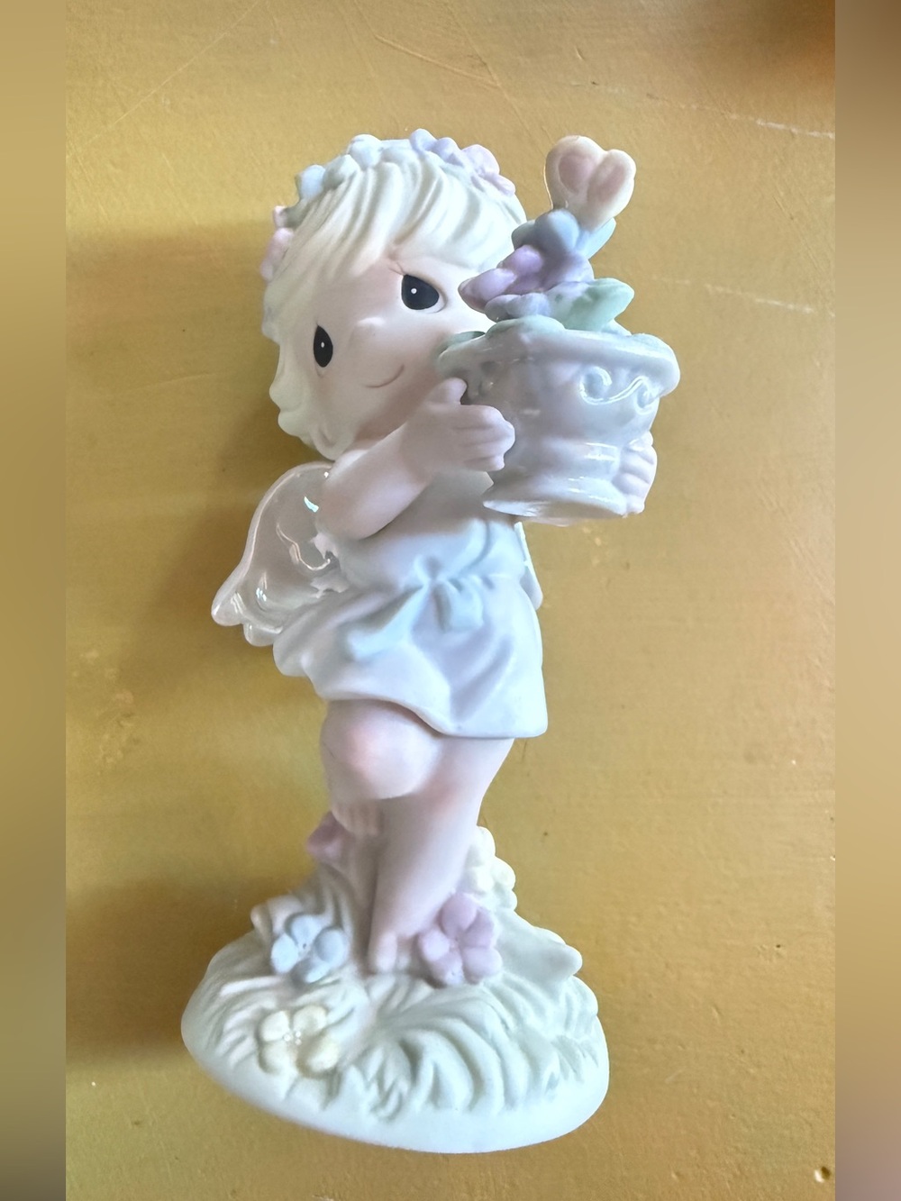 Precious Moments Figurine in White and Pastel Pink